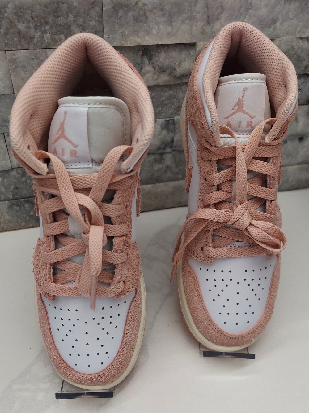 Nike Air Jordan Pink and White High-Top Sneakers